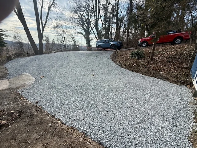 Curved crushed stone driveway install, South State Paving, Southern Maryland