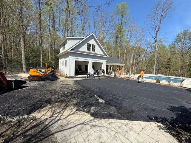 Fresh mat going down at a new-build garage, South State Paving, Southern Maryland