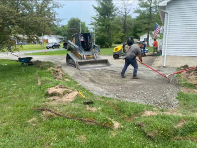 Grading and stone base preparation before paving