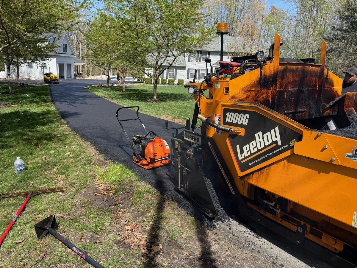 LeeBoy paver and plate compactor on a narrow lane, South State Paving, Southern Maryland