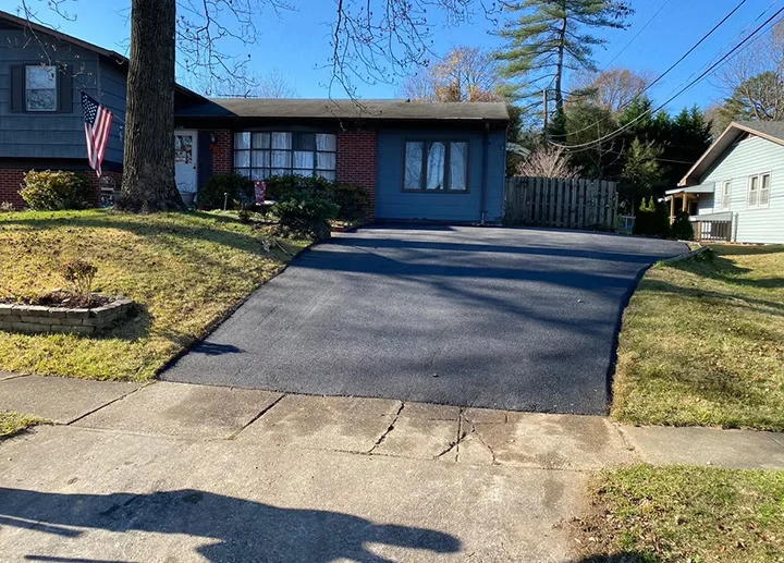 Sloped driveway replacement at a rancher, South State Paving, Southern Maryland