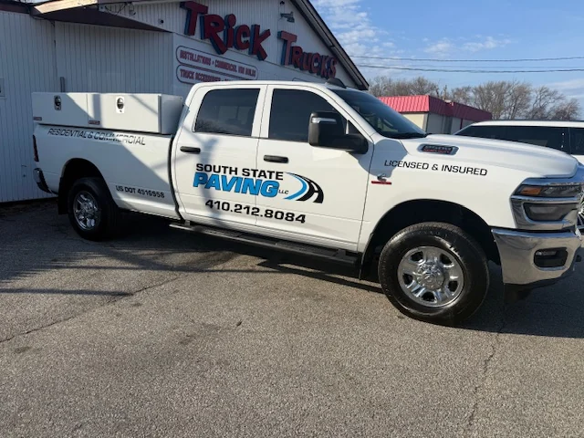 South State Paving pickup truck with licensed and insured lettering