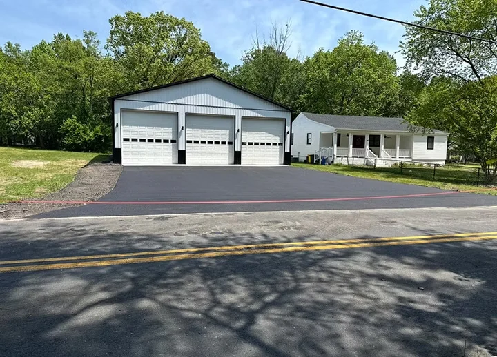 Wide apron and parking pad at a three-bay garage, South State Paving, Southern Maryland
